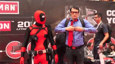 deadpool & superman stripping comic-con GIFs